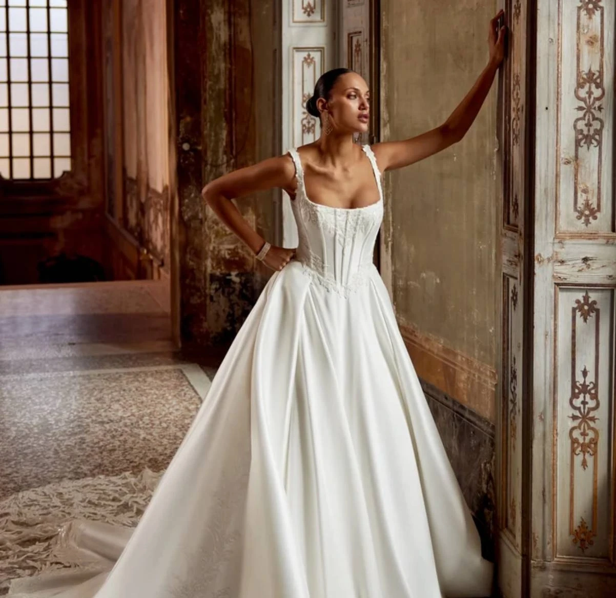 Model Wearing a bridal gown by Justin Alexander